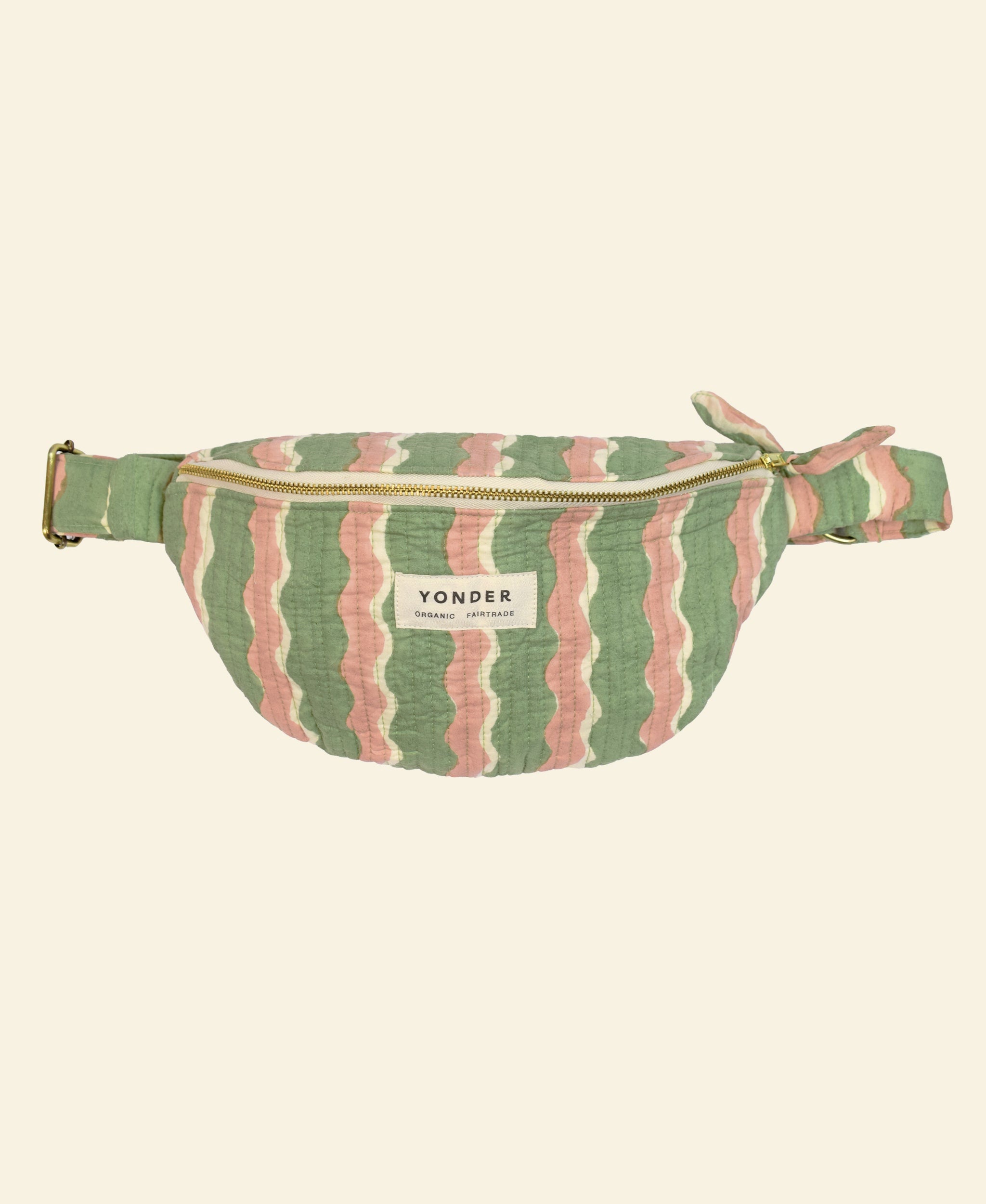 Yonder cotton quilted bum bag in mint whirly swirl, worn cross-body, hand block-printed in Jaipur