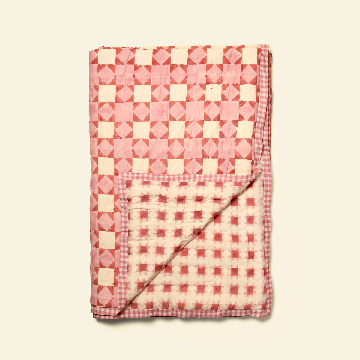 Yonder cotton quilt in clover floss, hand block-printed in Jaipur