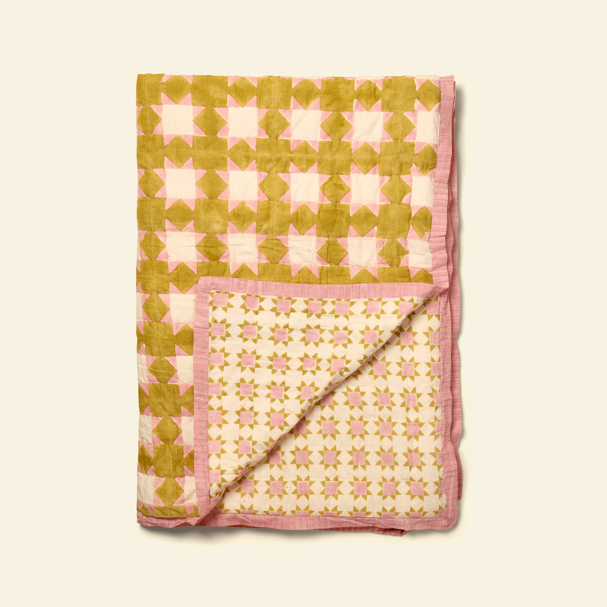 Yonder cotton quilt in clover honey, hand block-printed in Jaipur