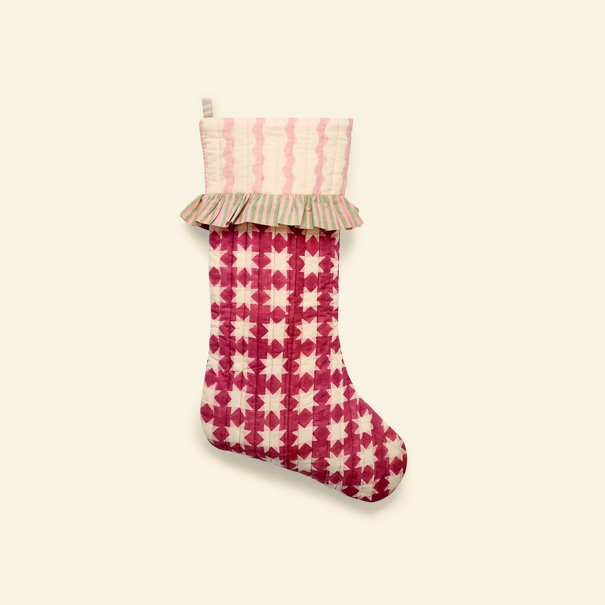 Yonder quilted christmas stocking in carousel jam, hand block-printed in Jaipur