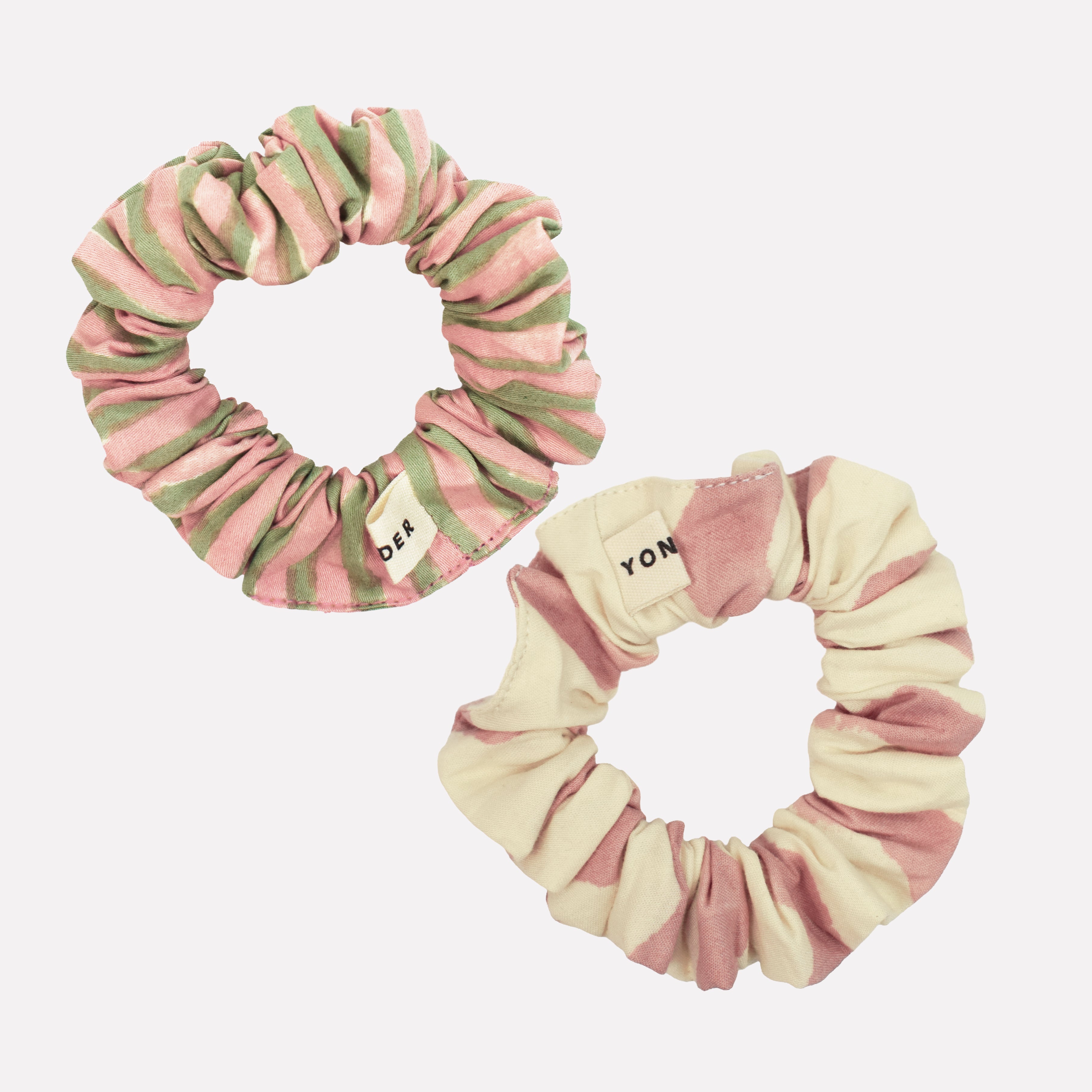 Two cotton mini scrunchies printed with green, pink, and cream striped pattern