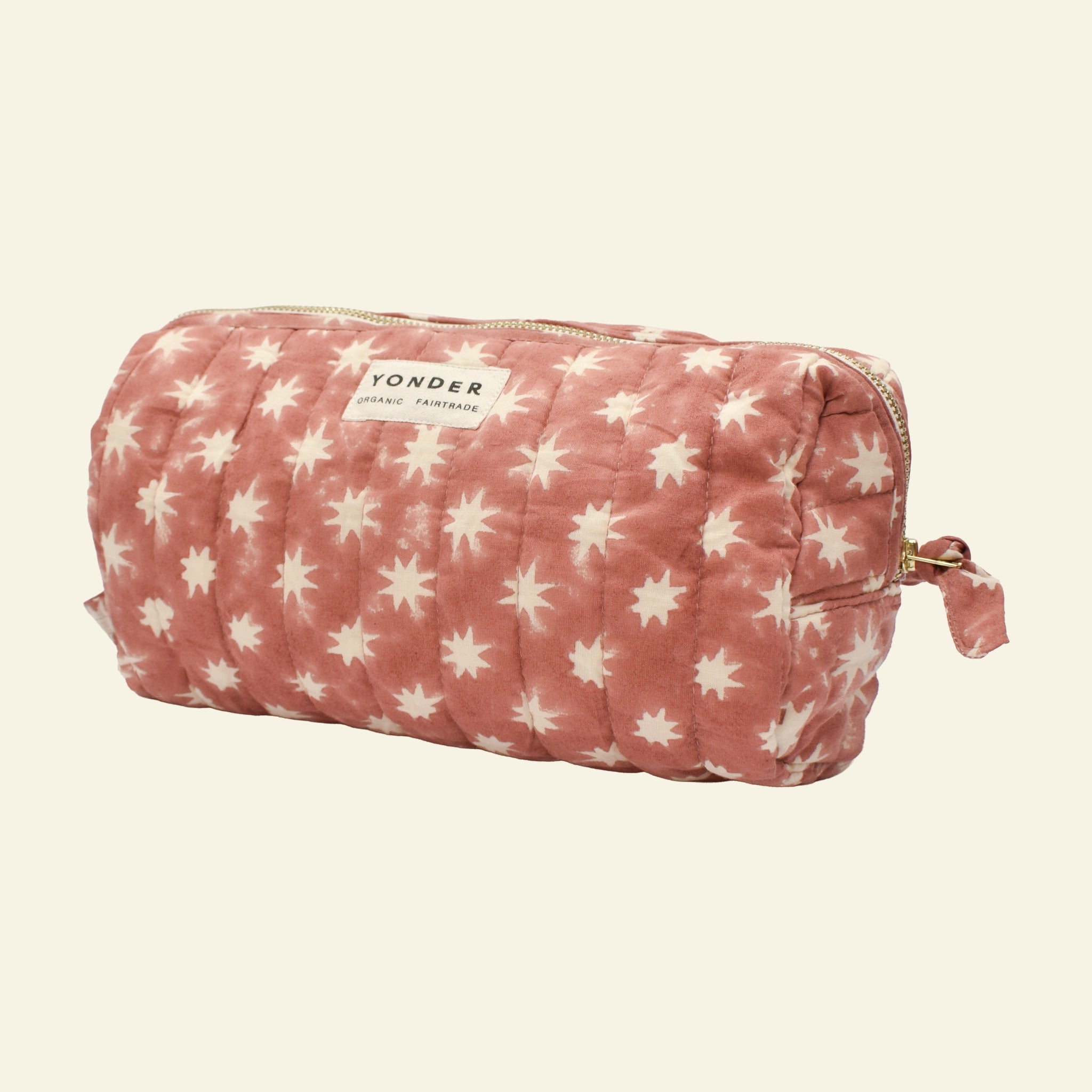 Yonder organic cotton Loaf wash bag in ginger Cosmic star print, with brass zip, hand block-printed in Jaipur