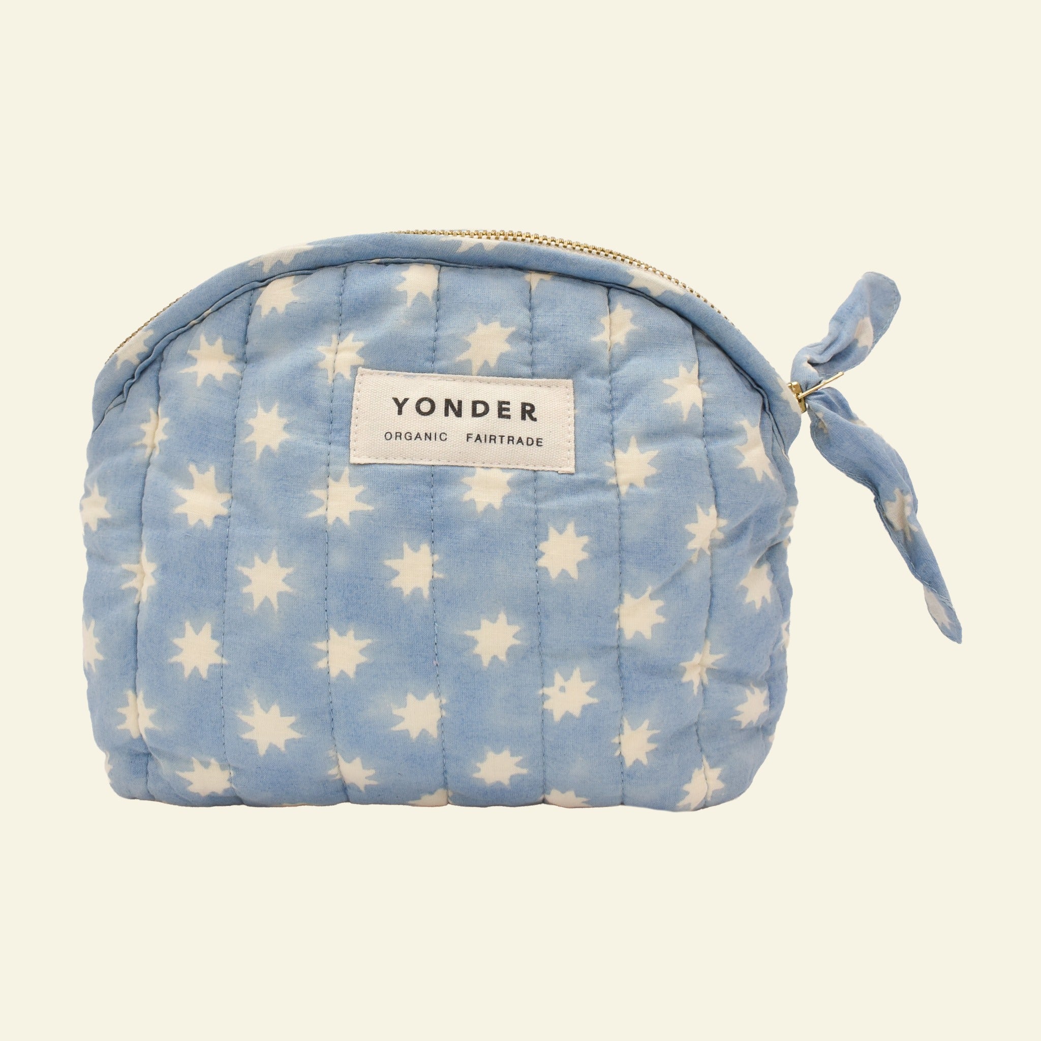 Yonder organic cotton quilted zip pouch in sky blue Cosmic star print, with brass zip, hand block-printed in Jaipur