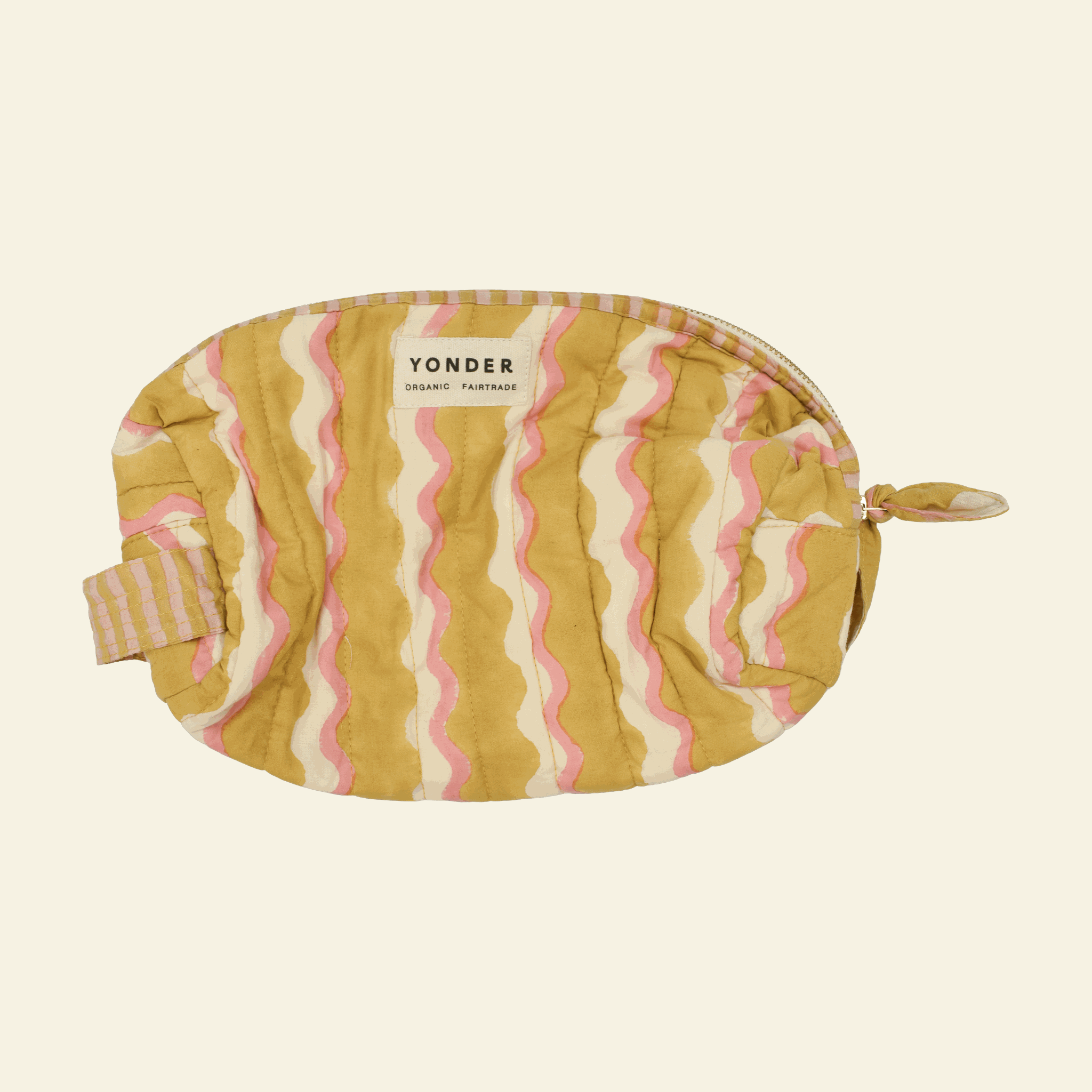 Loaf wash bag, Wiggle Honey, on cream