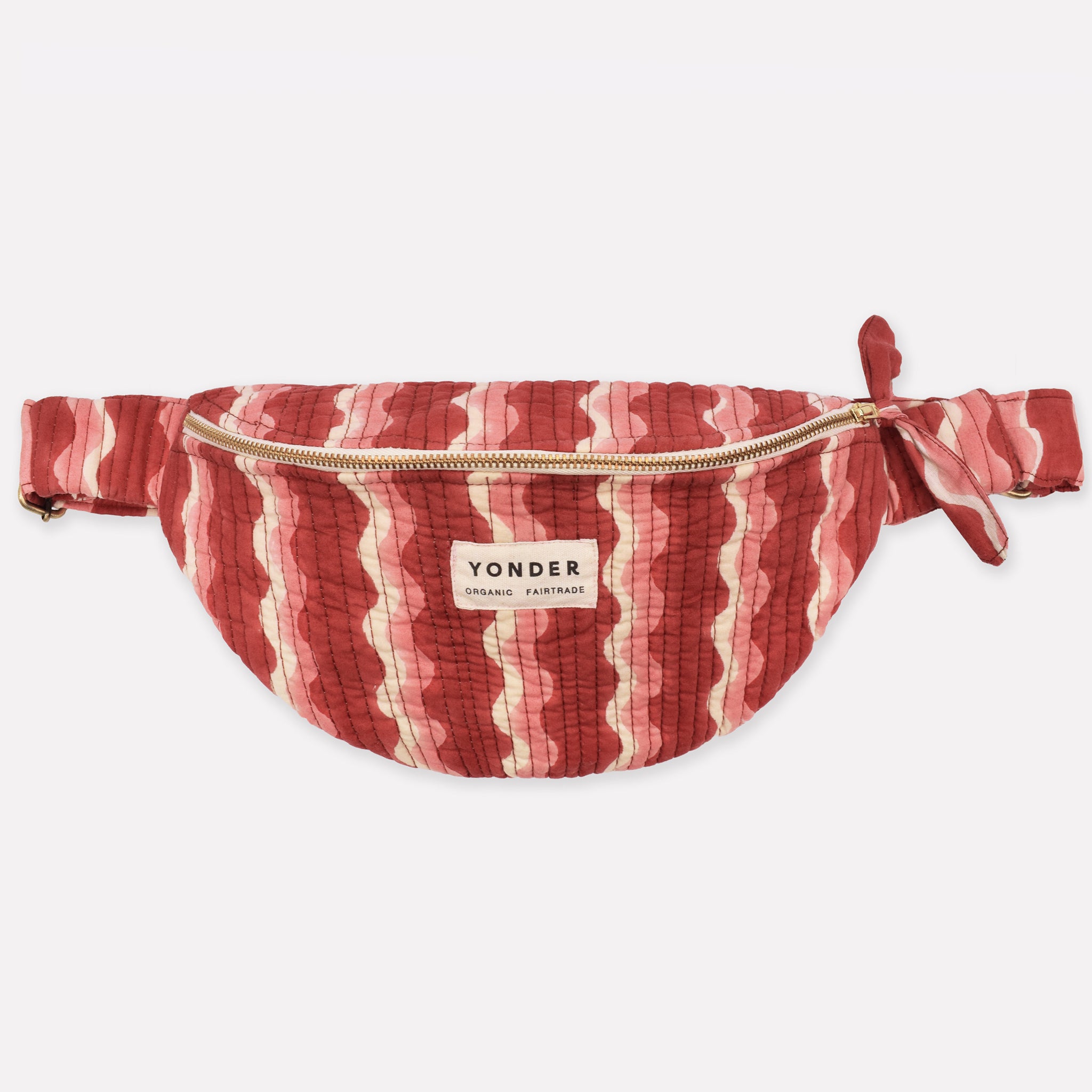 Cotton quilted bumbag/fanny pack printed with red and pink striped wave pattern