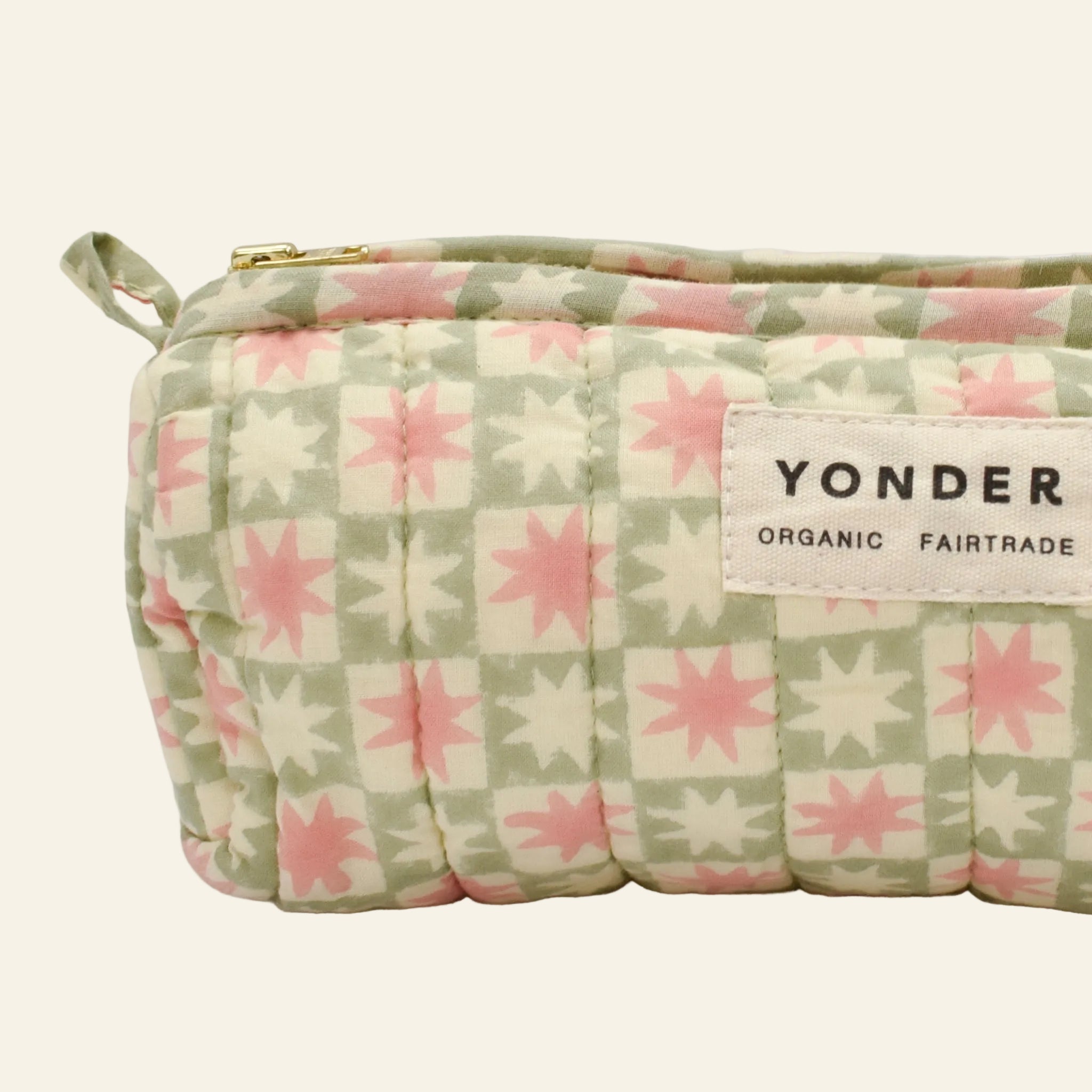Yonder soft organic cotton brioche wash bag in peppermint green pinwheel star print, close-up, hand block-printed in Jaipur