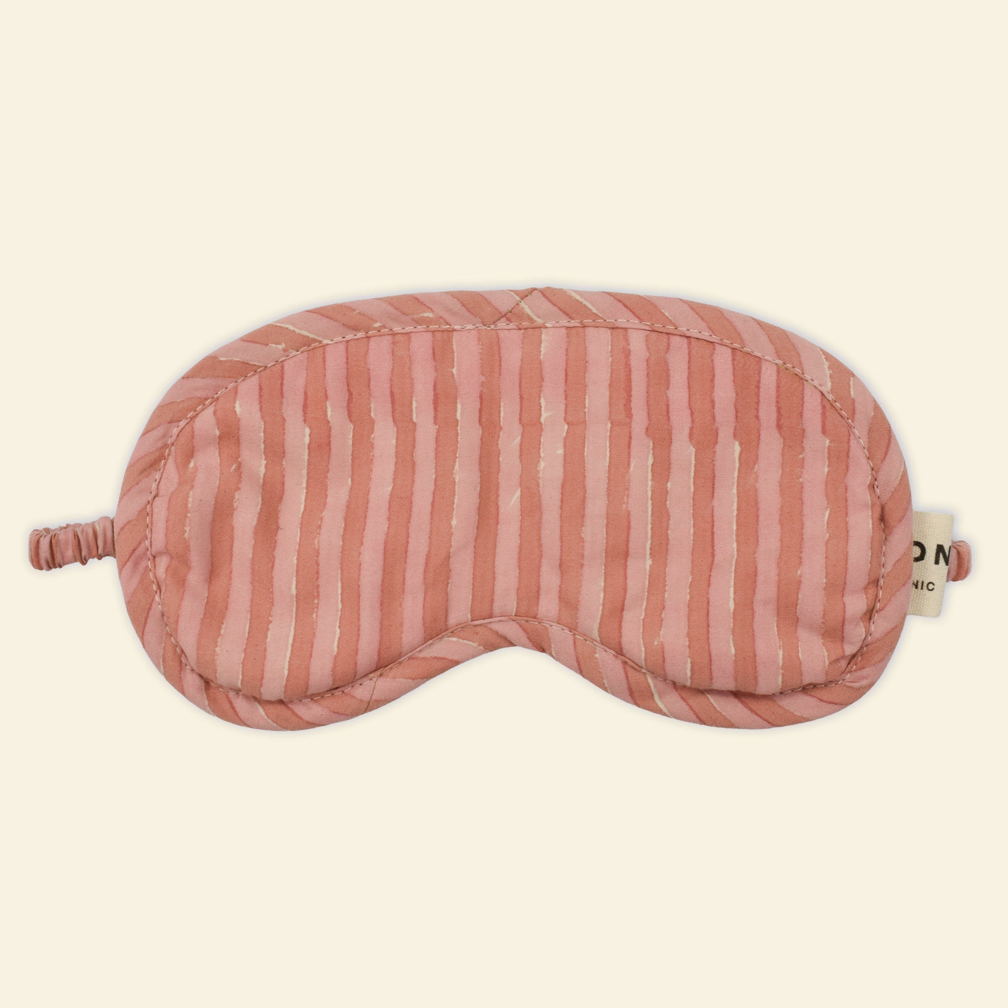 Yonder organic cotton eye mask in Rhubarb soft pink candy stripe, hand block-printed in Jaipur