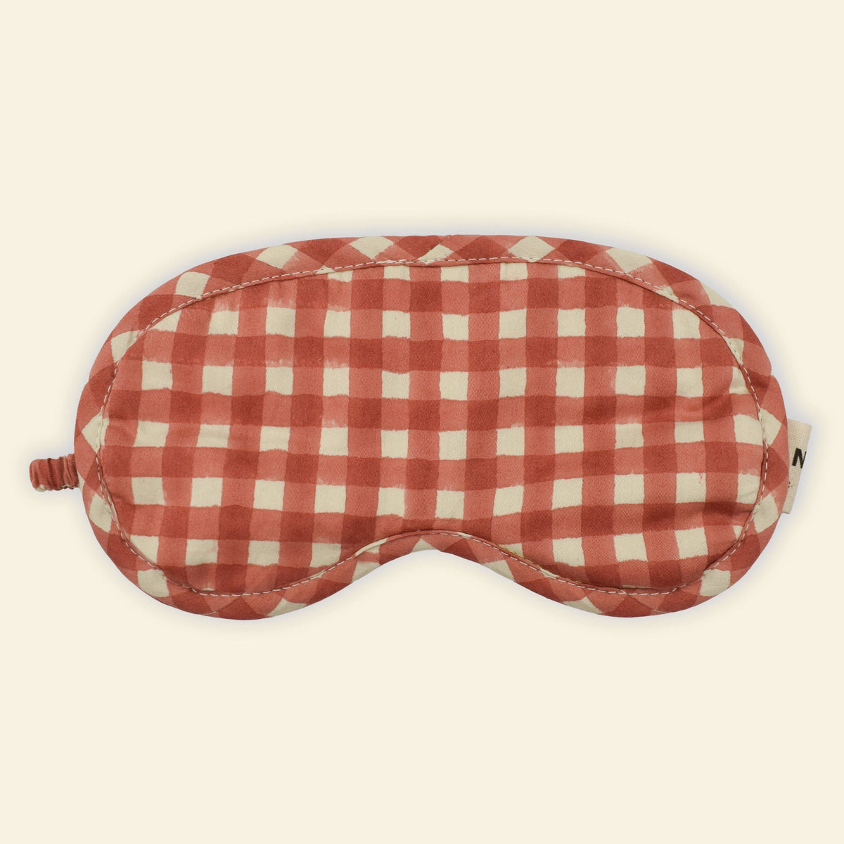Yonder organic cotton eye mask in Ginger red and white gingham, hand block-printed in Jaipur