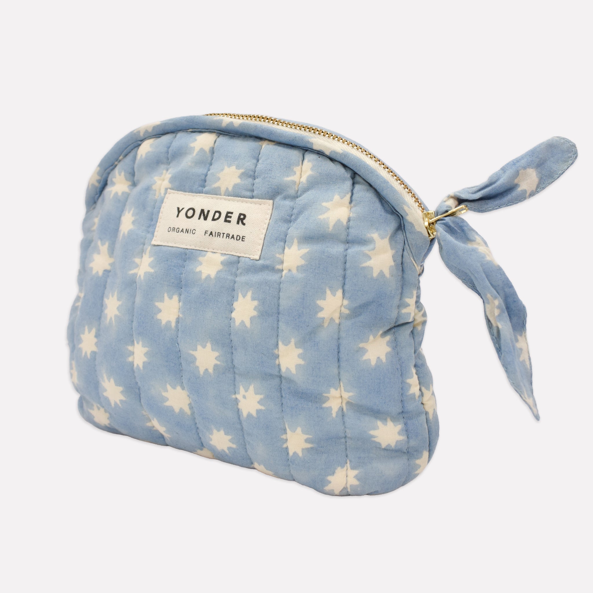 Cotton quilted zip pouch printed with light blue and white star pattern