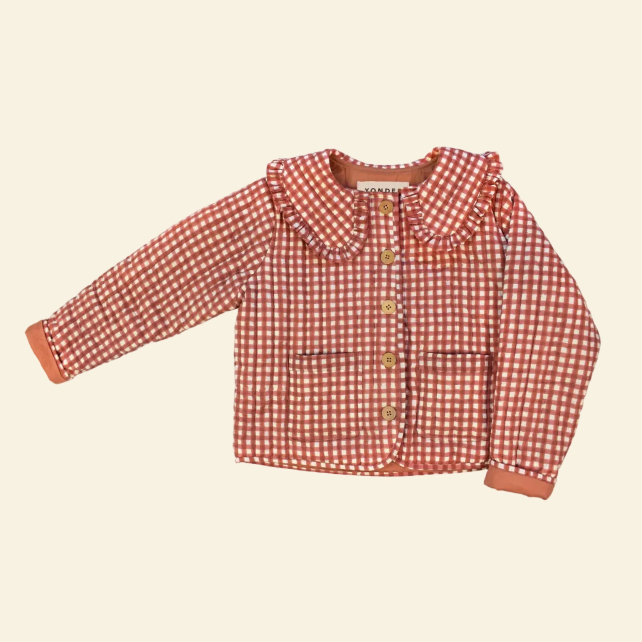 Cotton quilted jacket printed with red gingham pattern and frill collar
