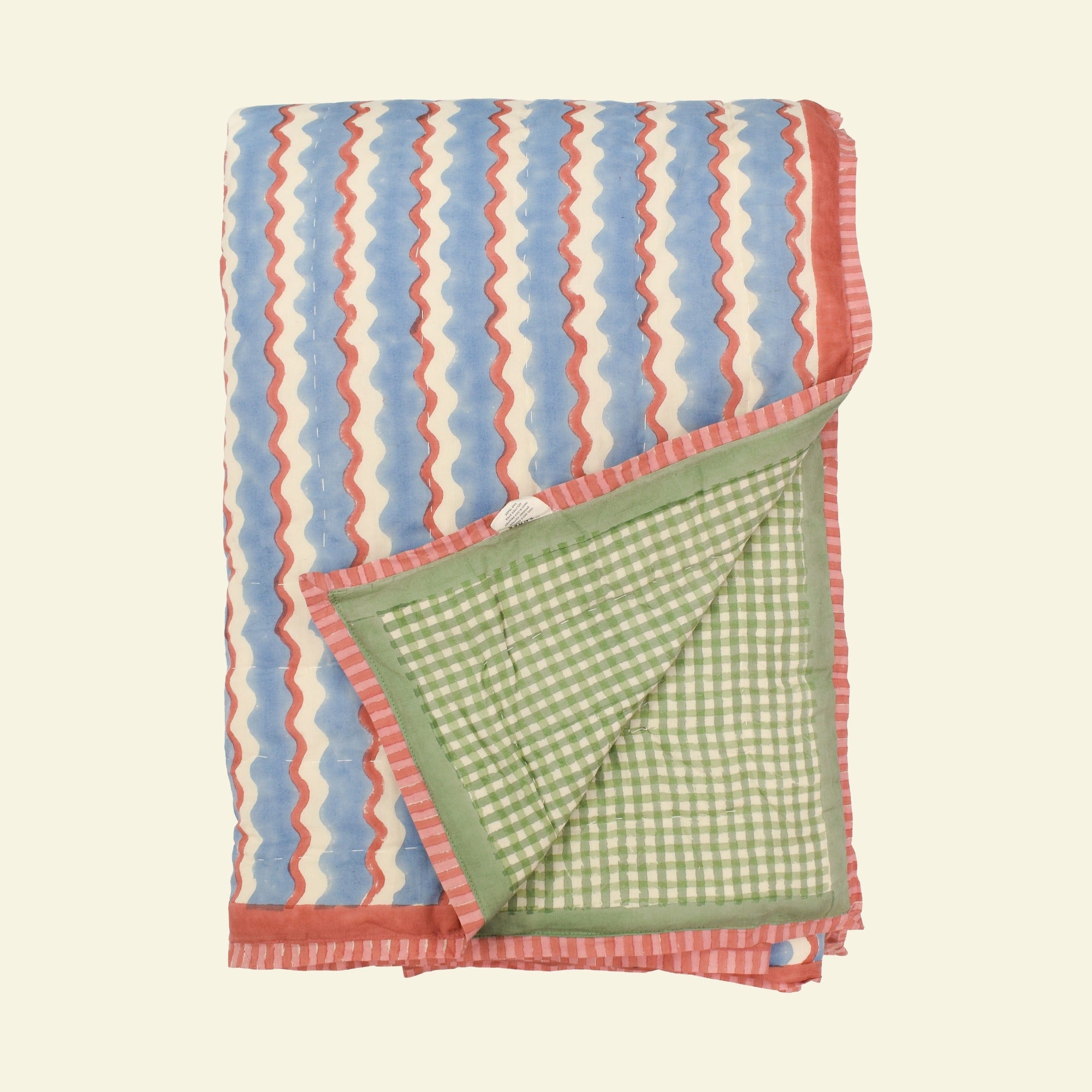 Yonder quilt on a cream background