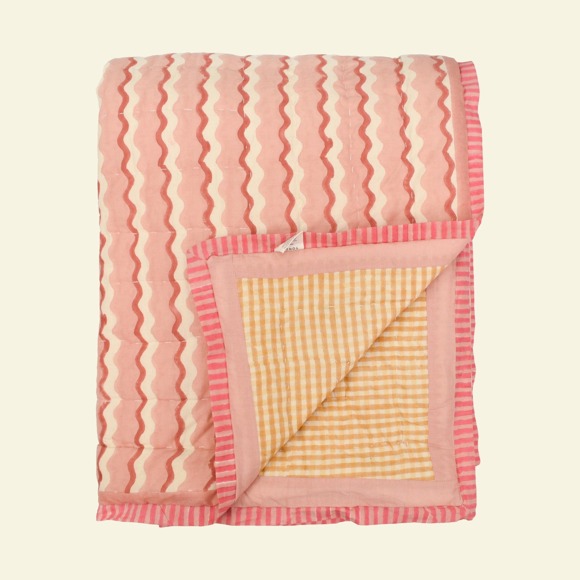 Yonder quilt on a cream background