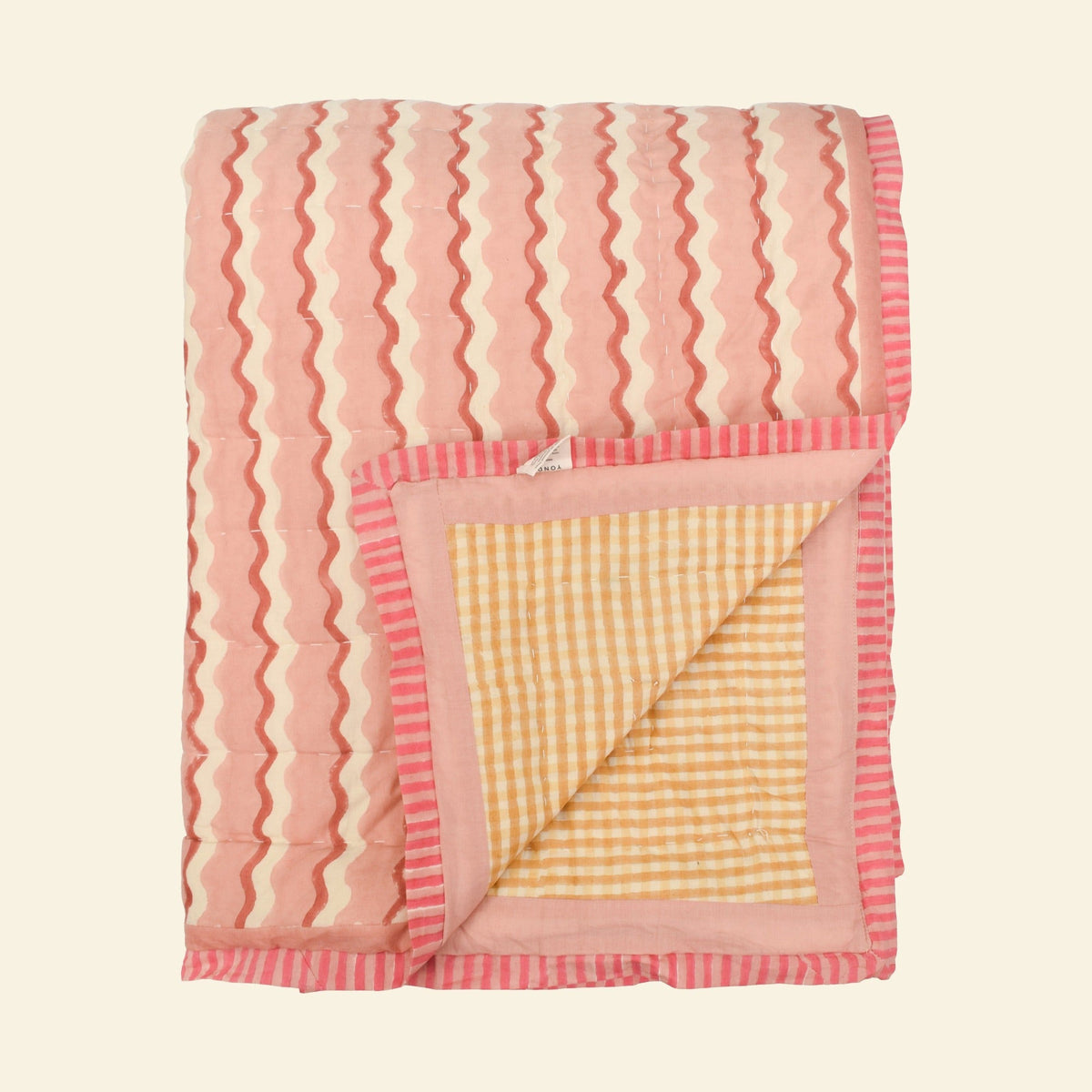 Yonder quilt on a cream background
