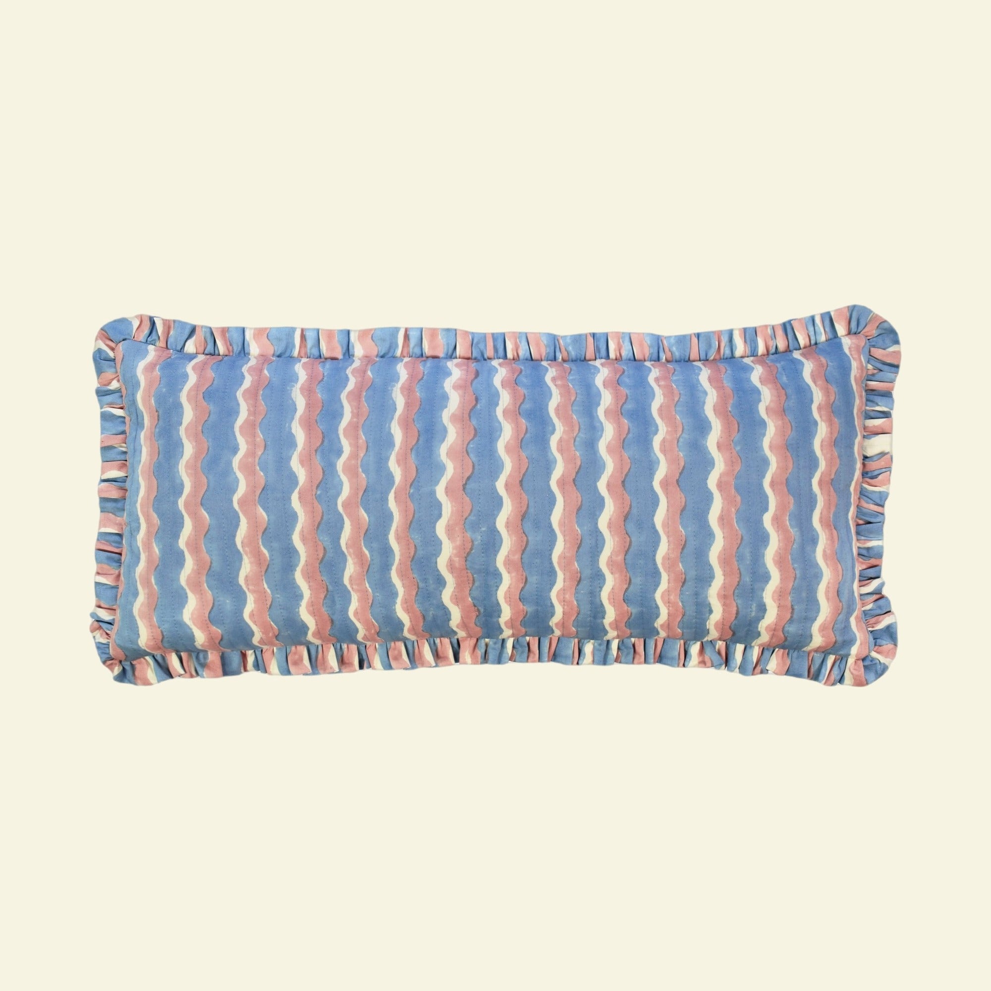 Yonder Living long bolster quilted frill cushion in Whirly blueberry block print, cool blue and neutral waves, hand-printed in Jaipur