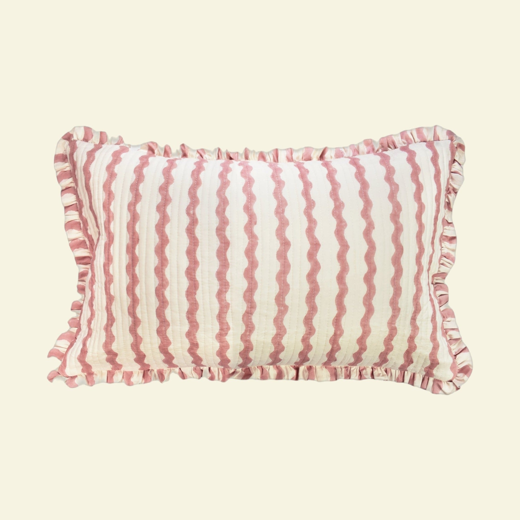 Yonder Living organic cotton quilted frill cushion in Ripple ice cream block print, soft rose and ivory ripples with frilled edge, medium