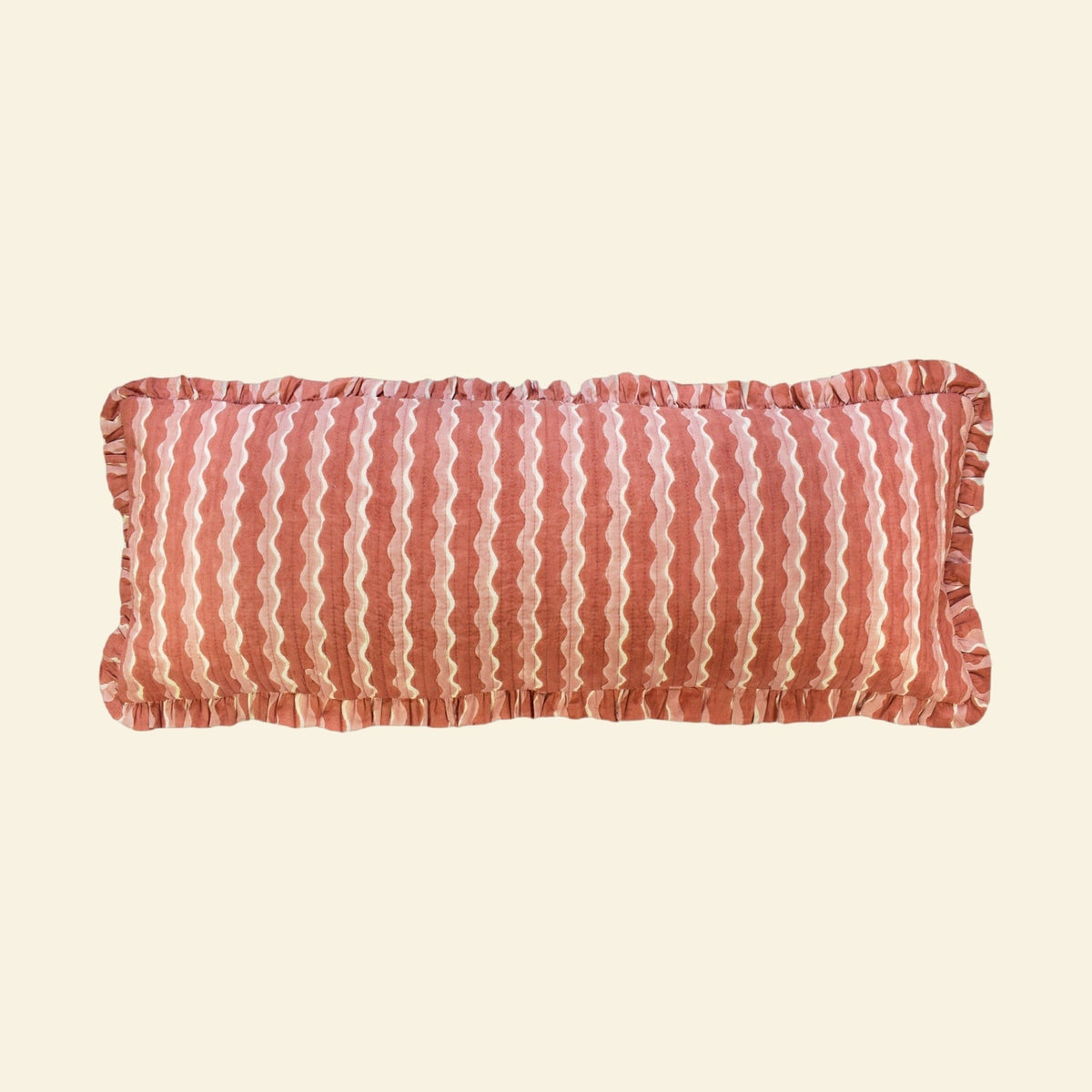 Yonder Living long bolster quilted frill cushion in Whirly ginger block print, warm ginger and cream waves, hand-printed in Jaipur