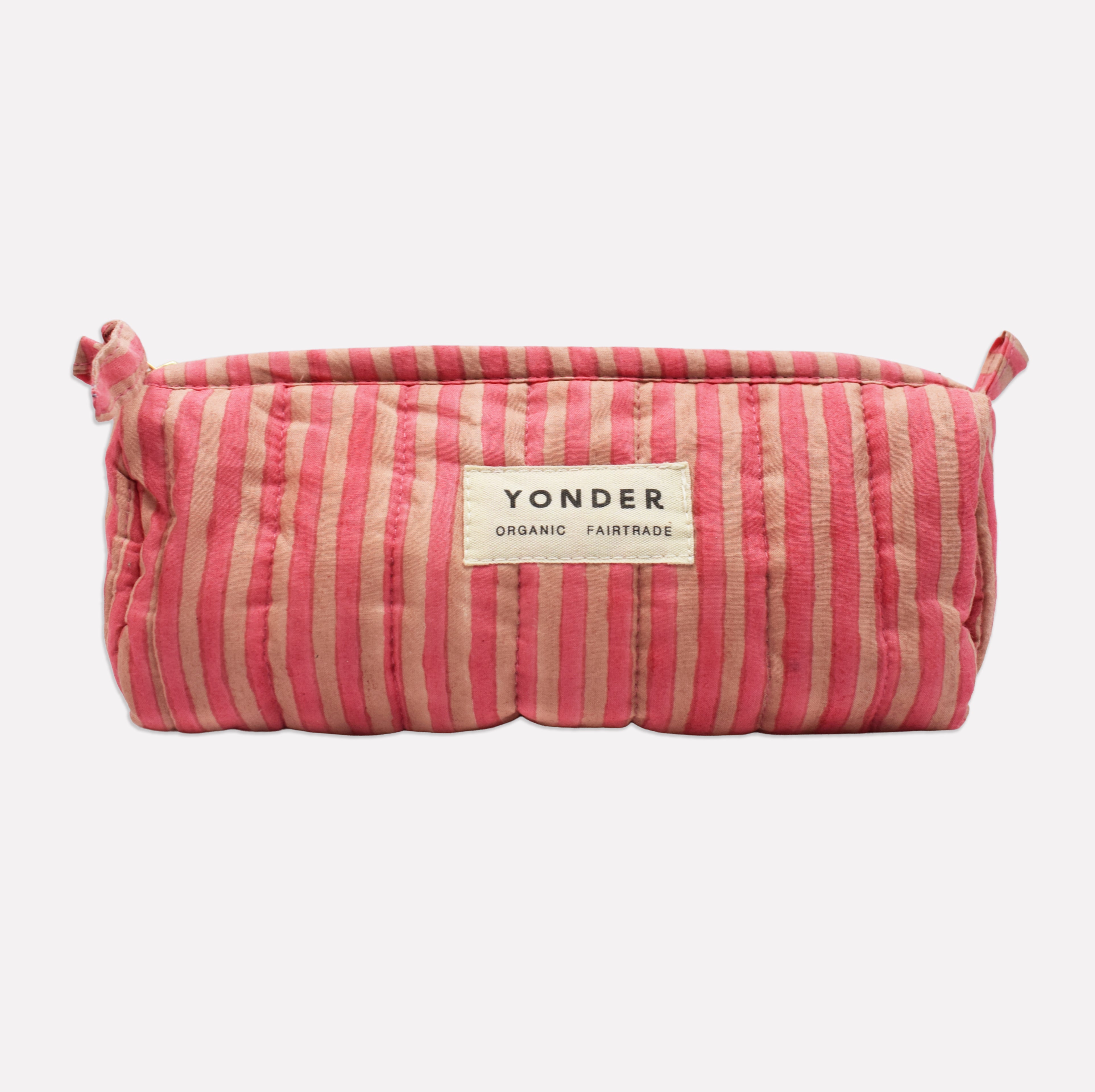 Yonder soft organic cotton brioche wash bag in pink and tan lychee candy stripe with brass zip, hand block-printed in Jaipur