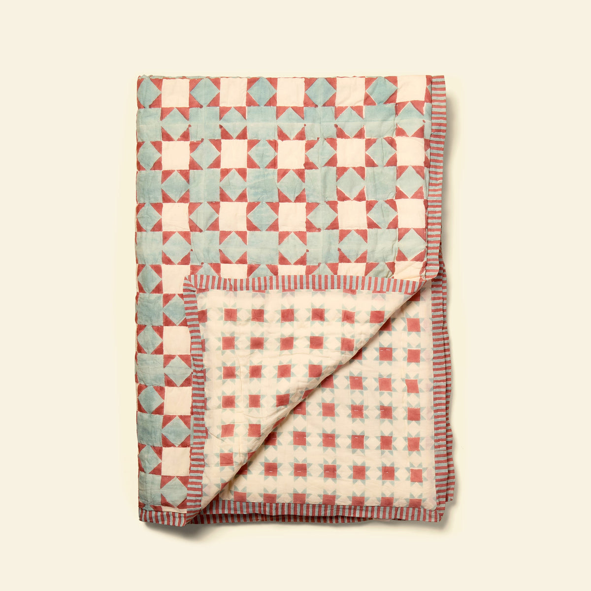 Yonder cotton quilt in clover cloud, hand block-printed in Jaipur