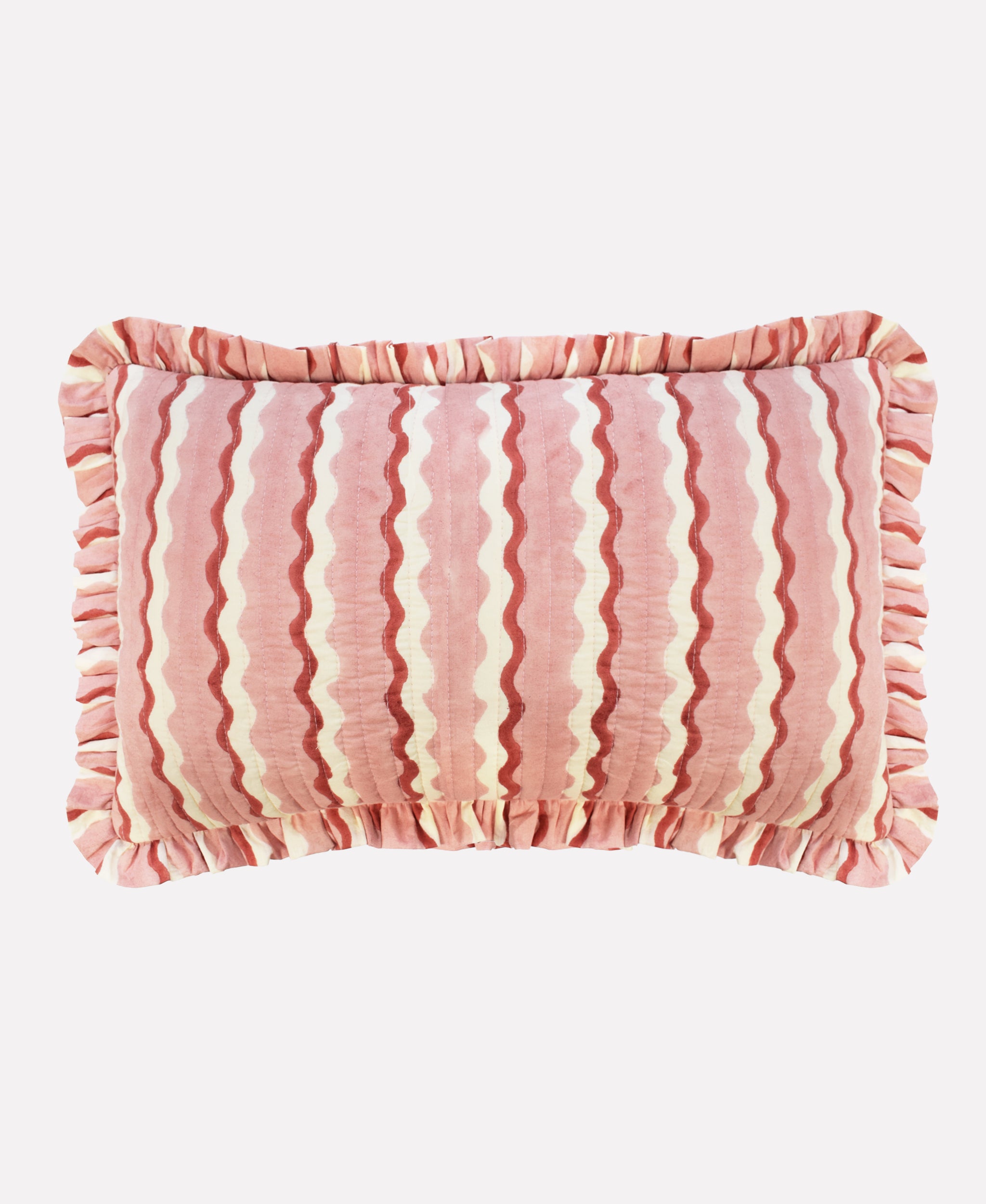 Cotton quilted cushion printed with pink and white striped wave pattern and frill border