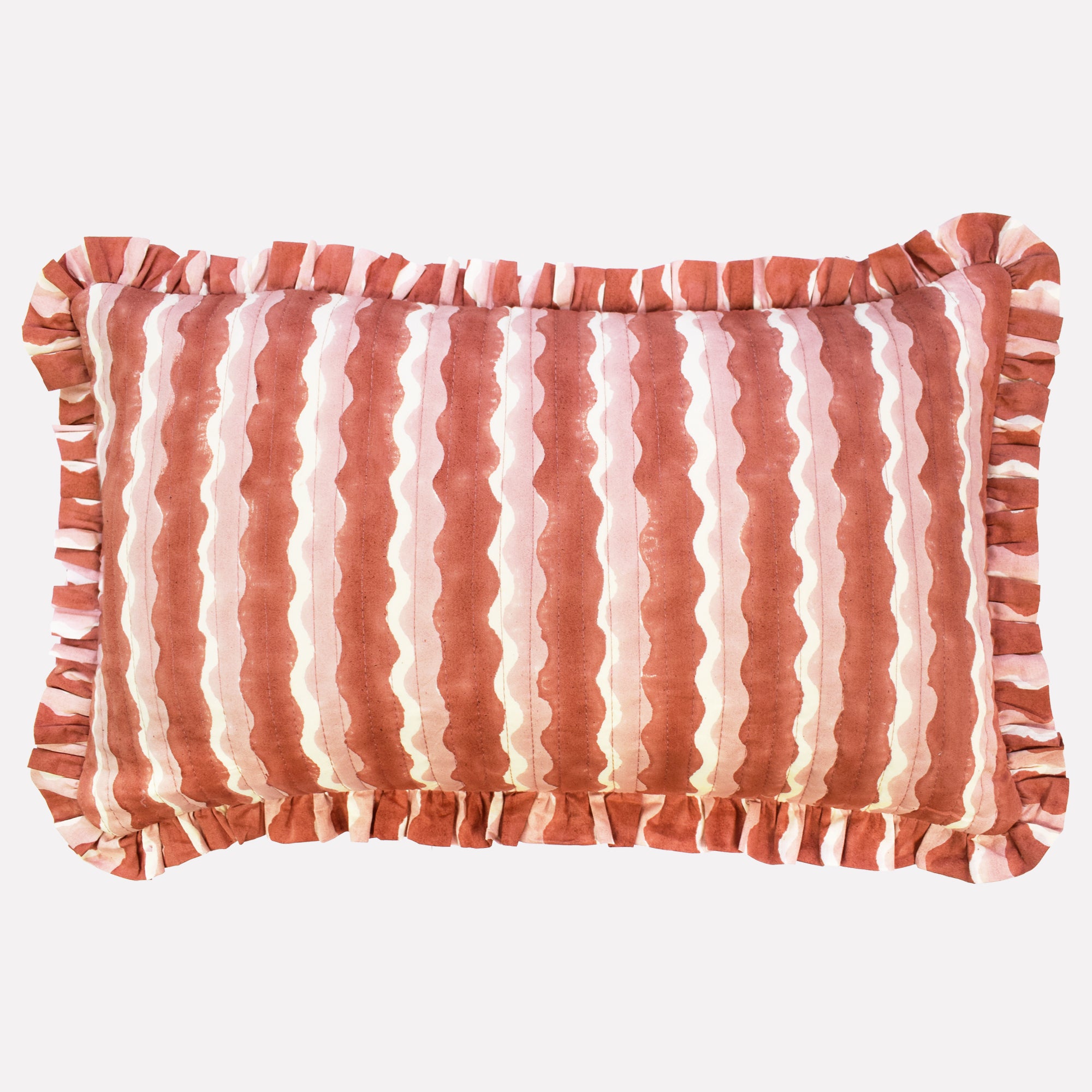 Cotton quilted cushion printed with pink striped wave pattern and frill border