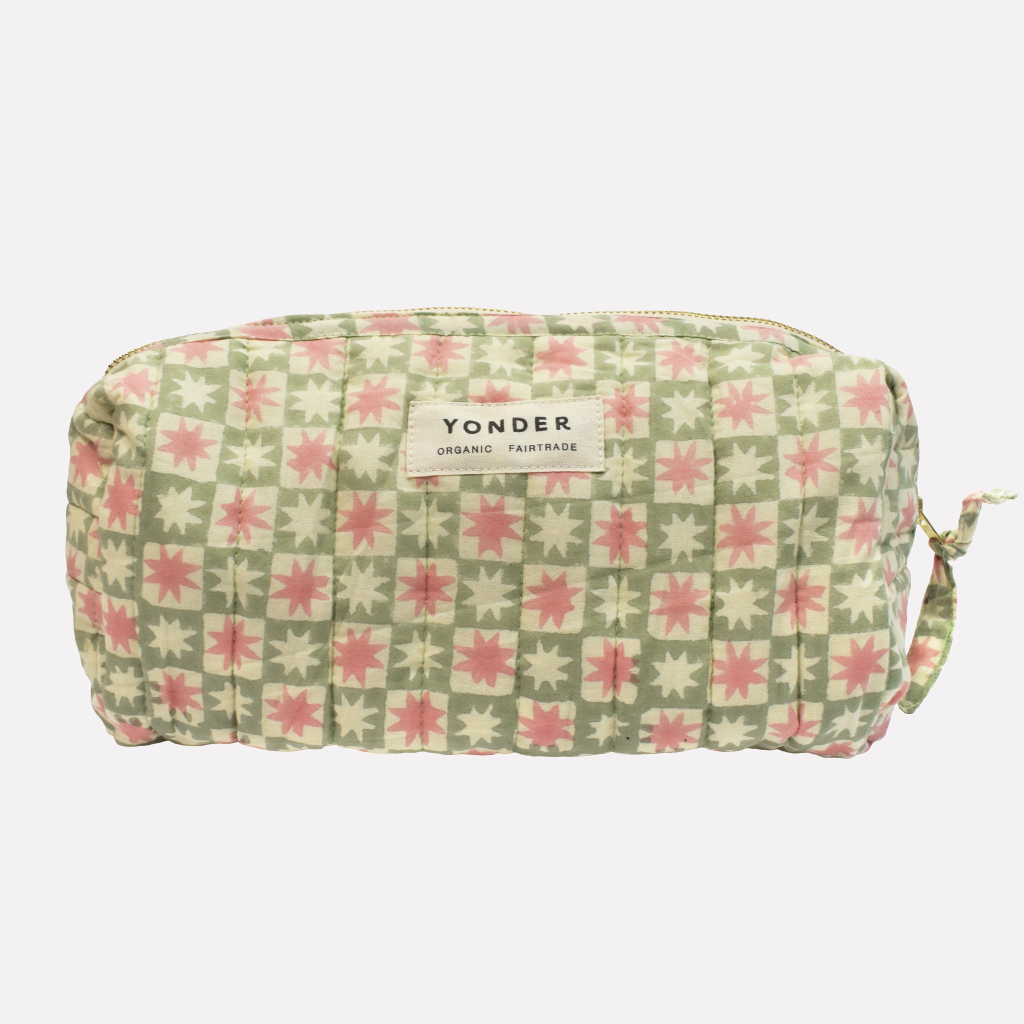 Cotton quilted wash/toiletry bag printed with green, pink, and white star pattern