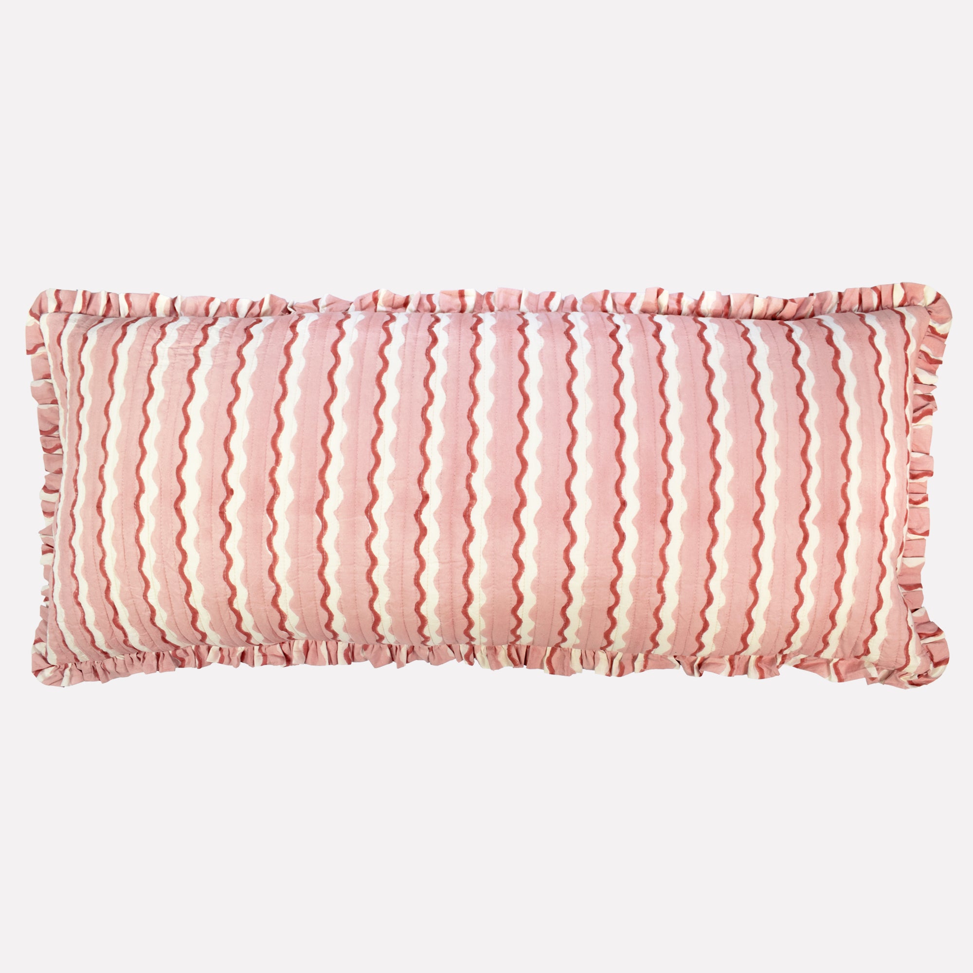 Long cotton quilted cushion printed with pink and white striped wave pattern and frill border