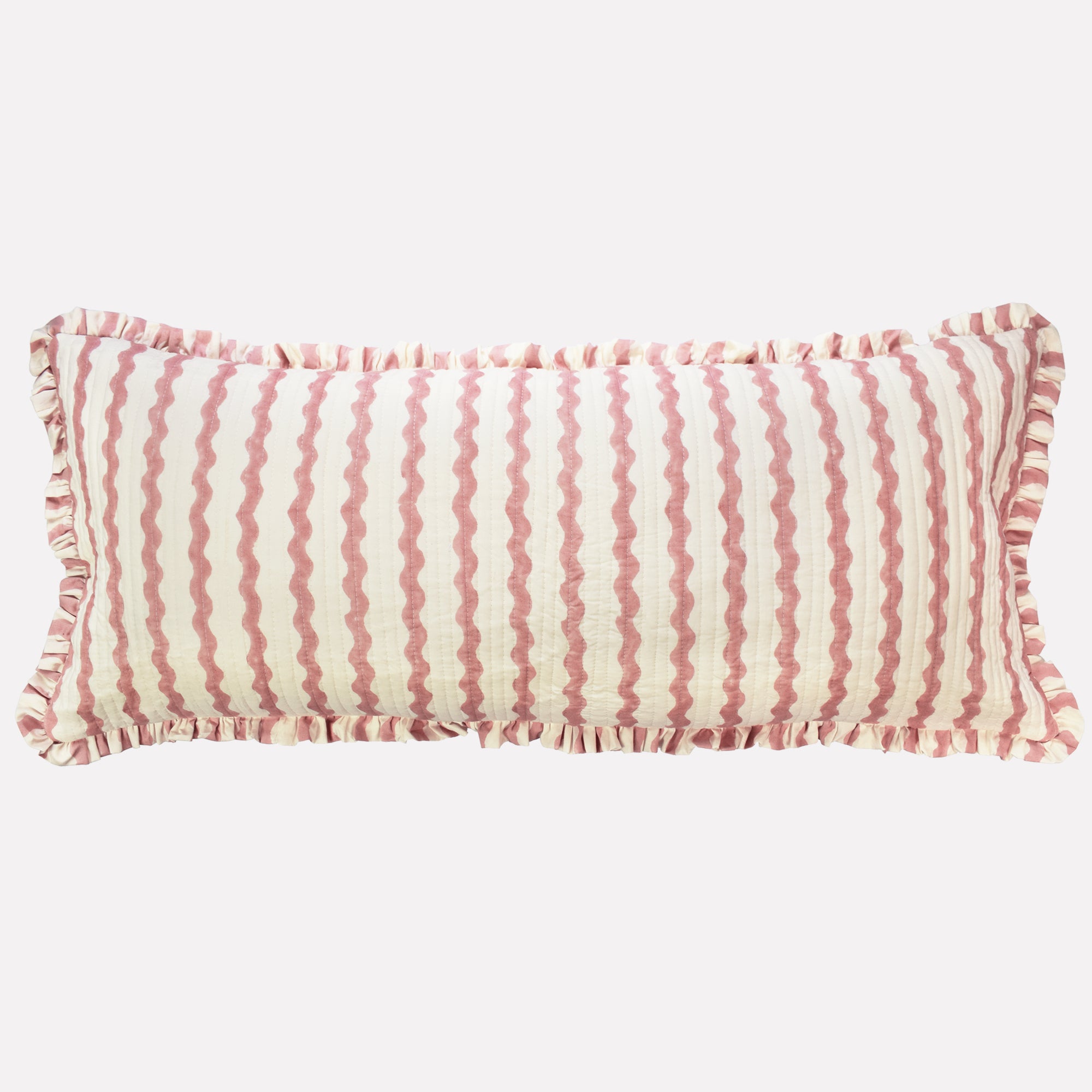Long cotton quilted cushion printed with pink and white striped wave pattern and frill border