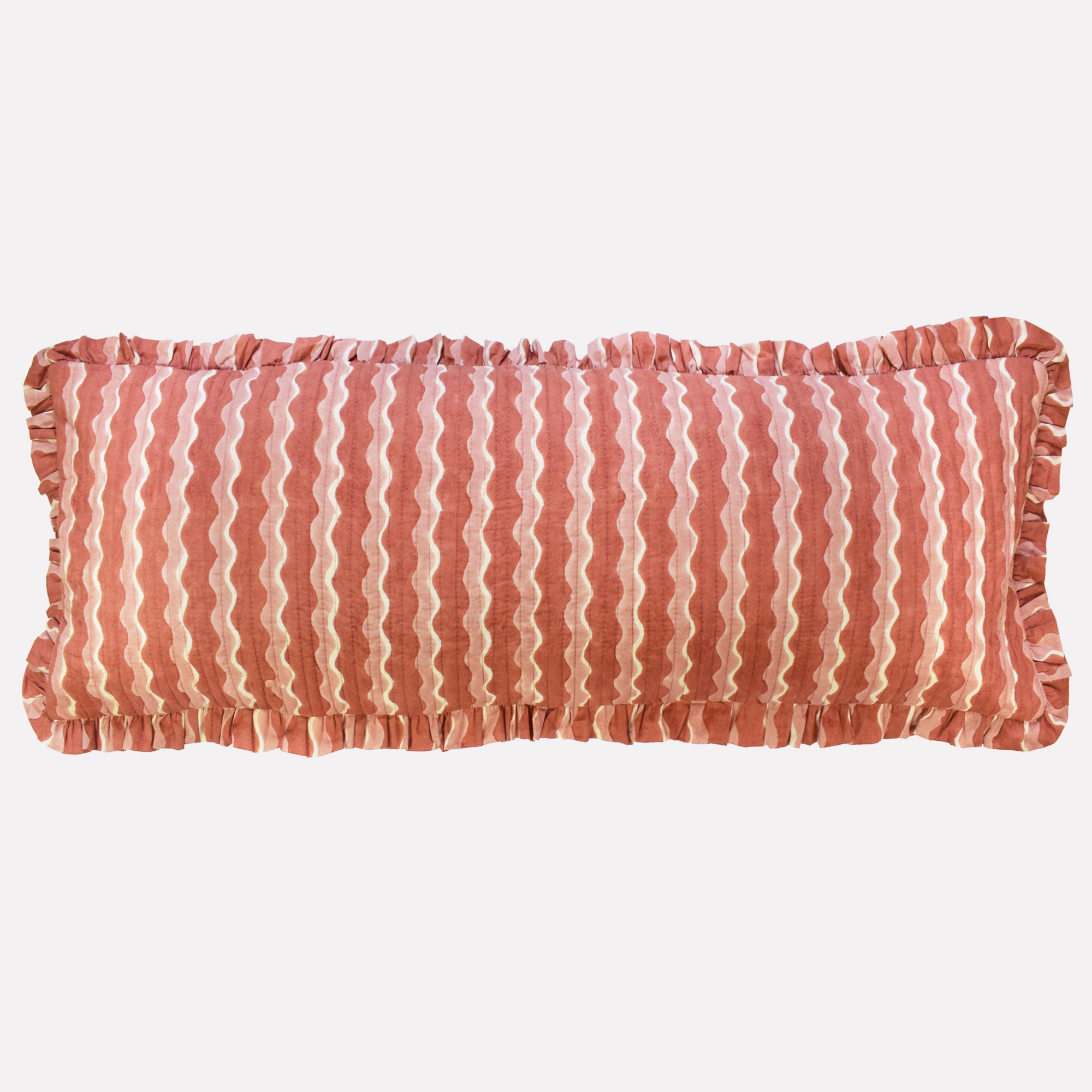 Long cotton quilted cushion printed with pink striped wave pattern and frill border