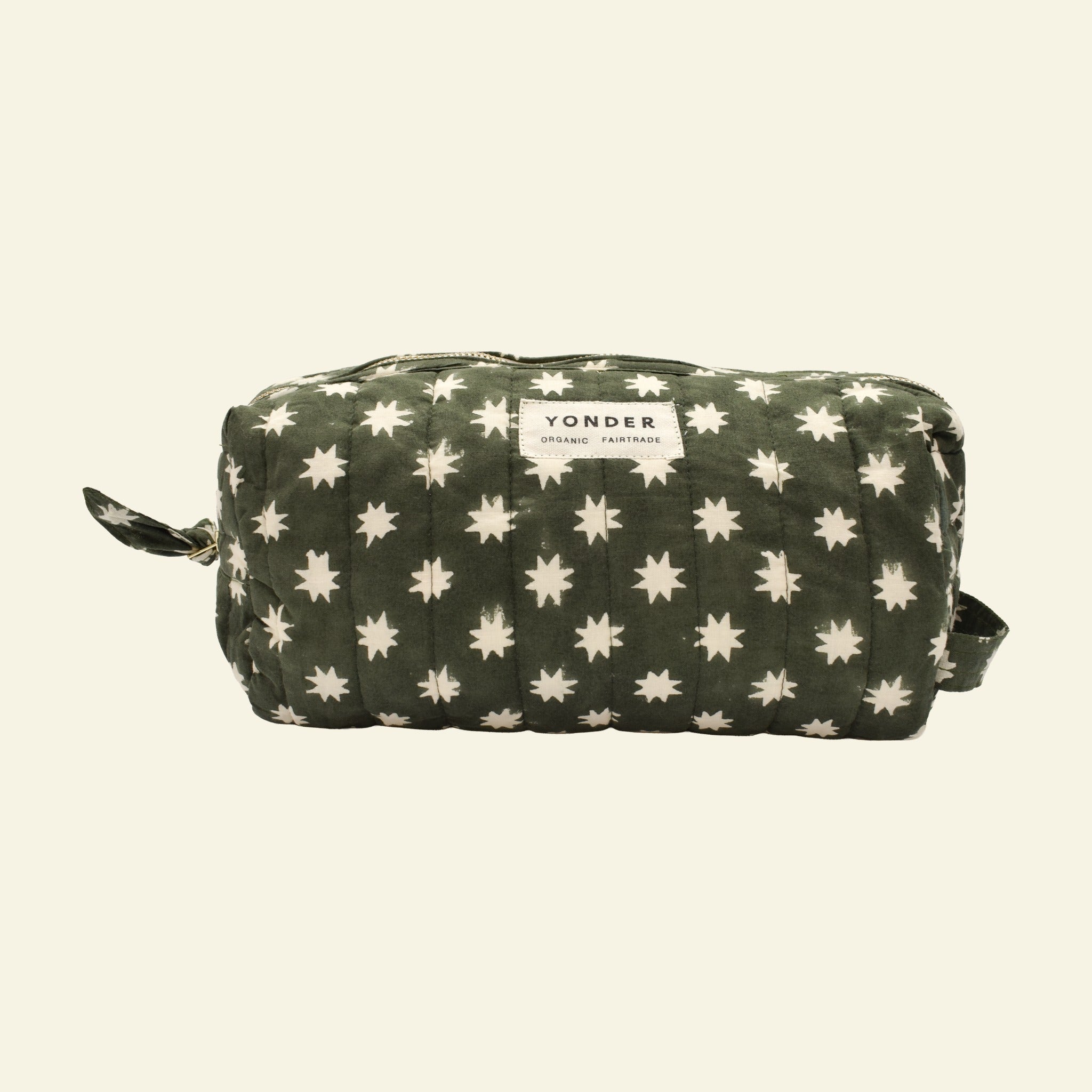 Yonder organic cotton Loaf wash bag in fern green Cosmic star print, with brass zip, hand block-printed in Jaipur