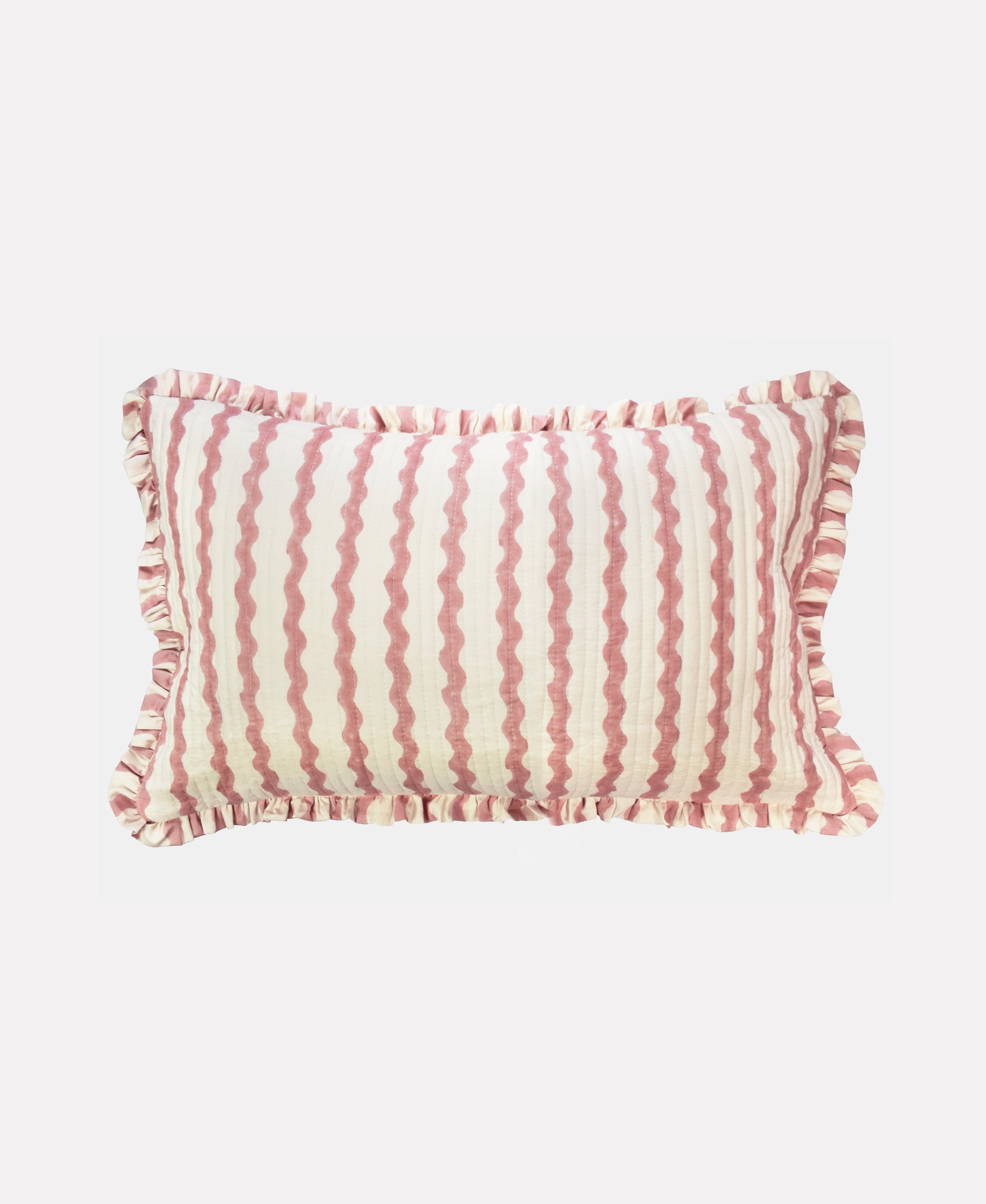 Small cotton quilted cushion printed with pink and white striped wave pattern and frill border