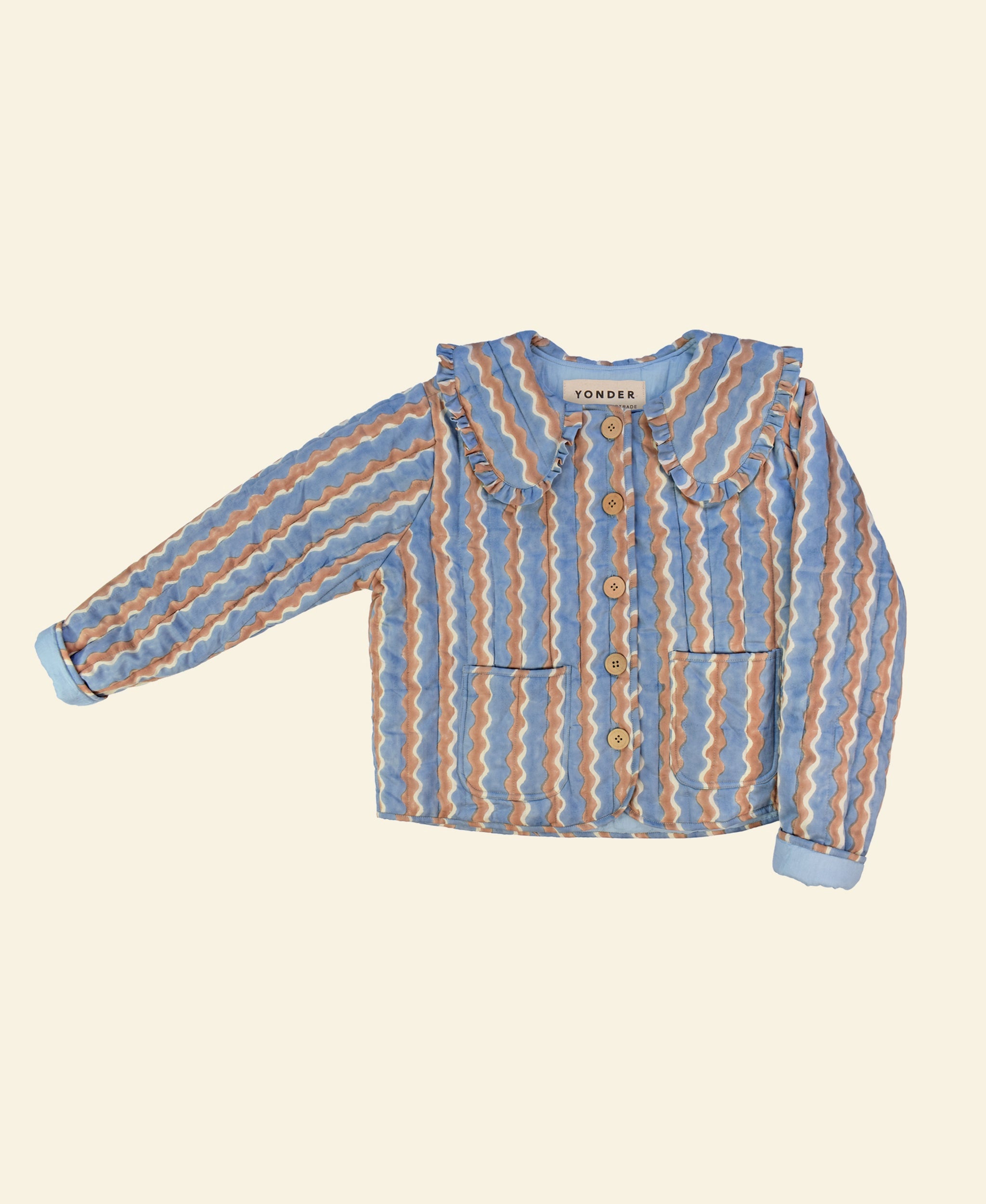 Cotton quilted jacket printed with blue and brown striped wave pattern and frill collar